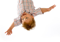 stock-photo-3791423-small-baby-boy-hanging-upside-down-on-white.jpg