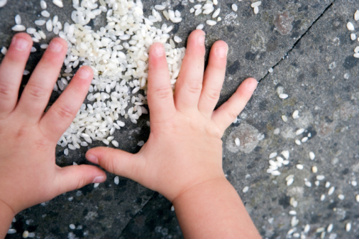 child-playing-with-rice.jpg